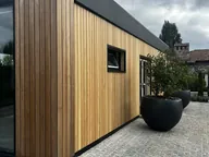 Фасад из планкена лиственницы